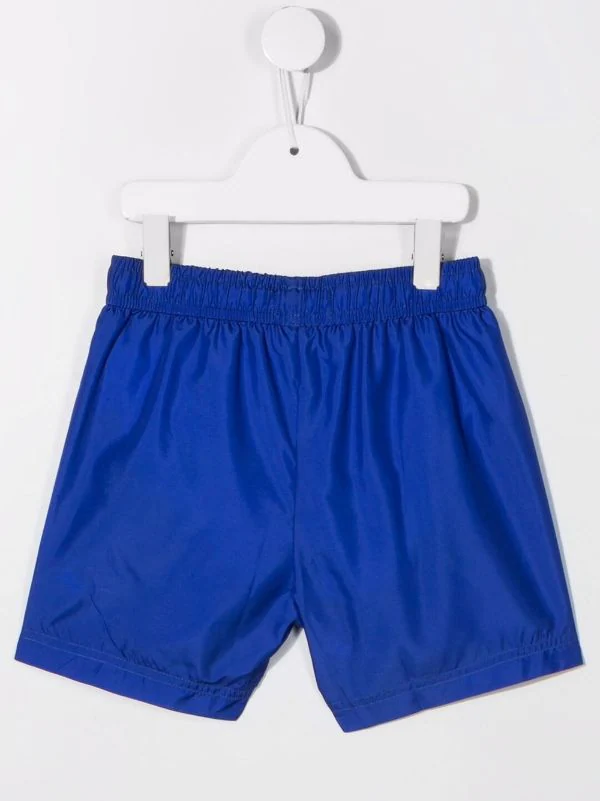 ( Nouvelle Collection ) Moschino Kids Short De Bain à Logo Imprimé 40457 BLUE 4 ( Nouvelle Collection ) Moschino Kids Short De Bain à Logo Imprimé 40457 BLUE – Image 2