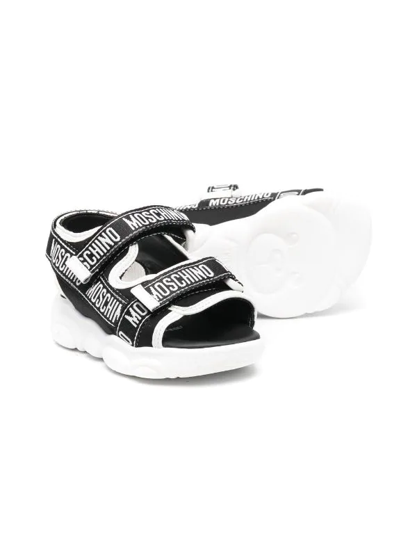 ( Nouvelle Collection ) Moschino Kids Sandales à Logo Imprimé NERO 4 ( Nouvelle Collection ) Moschino Kids Sandales à Logo Imprimé NERO – Image 2